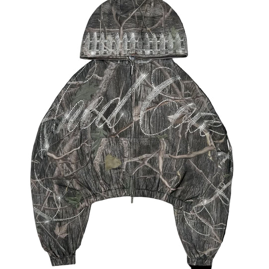 Camouflage hoodie with rhinestone embellishments on a black background