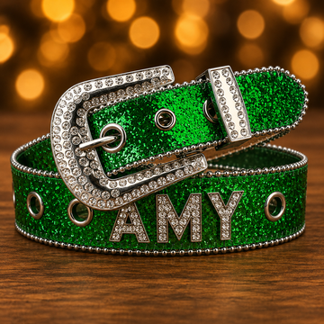 Green glitter rhinestone belt buckle with AMY letters on a green belt strap