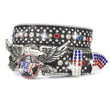 Decorative belt buckle with eagle design and colorful gemstones on a white background