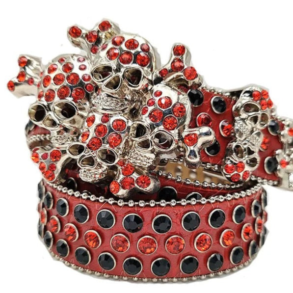 Red and silver bracelet with skull design on a white background