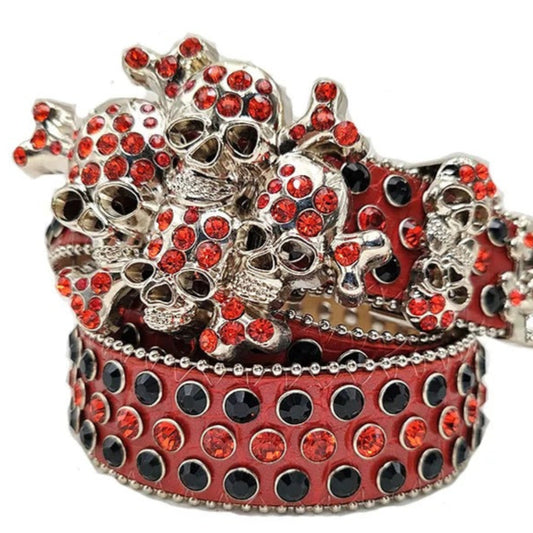 Red and silver bracelet with skull design on a white background