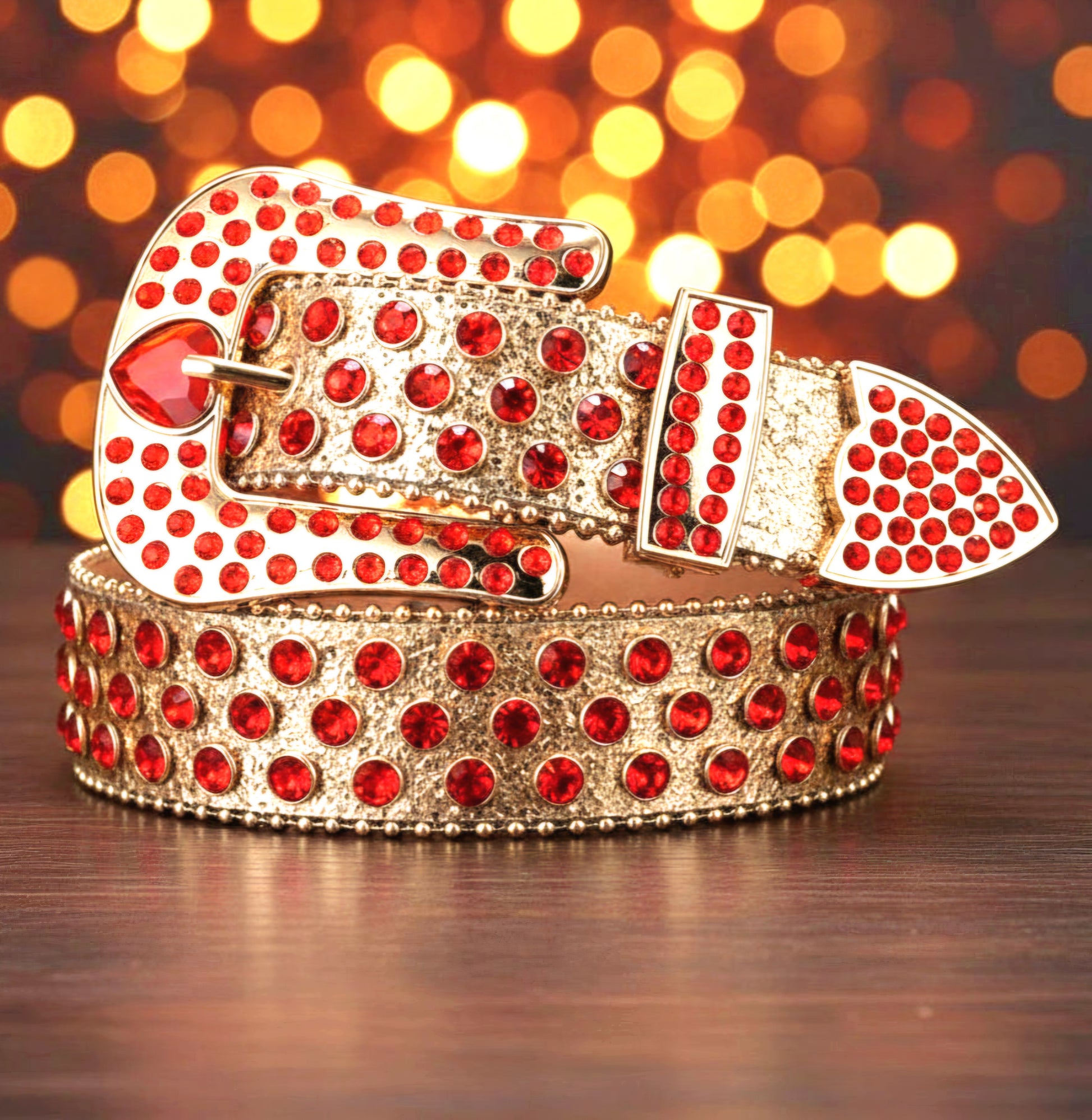 Rhinestone belt with gold-tone metal, red gems, and heart-shaped buckle, wide strap